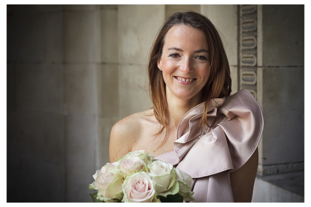 French bride poses for pictures at Westminster Town Hall